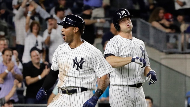 Aaron Hicks and Brett Gardner , The Canadian Press Aaron Hicks and Brett Gardner