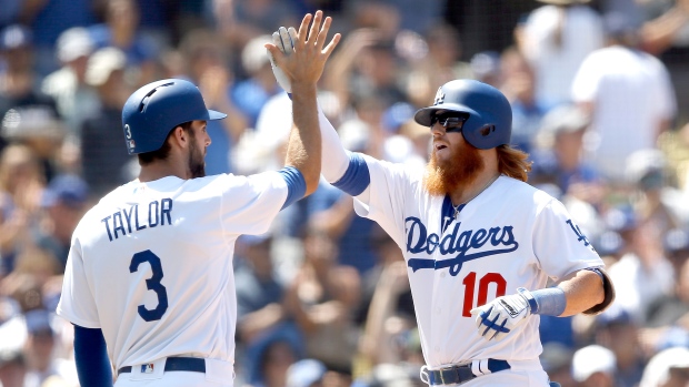 Justin Turner, Chris Taylor, The Canadian Press Justin Turner, Chris Taylor