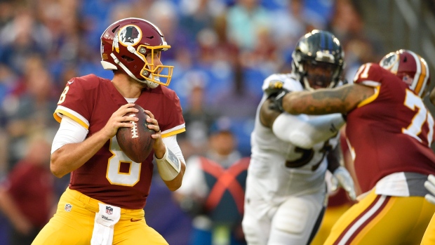 Kirk Cousins, The Canadian Press Kirk Cousins
