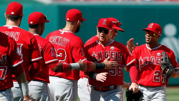 Kole Calhoun, Angels celebrate, The Canadian Press Kole Calhoun, Angels celebrate