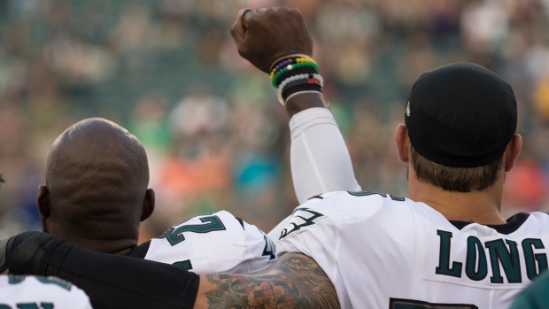 Malcolm Jenkins and Chris Long, Mitchell Leff/Getty Images Malcolm Jenkins and Chris Long