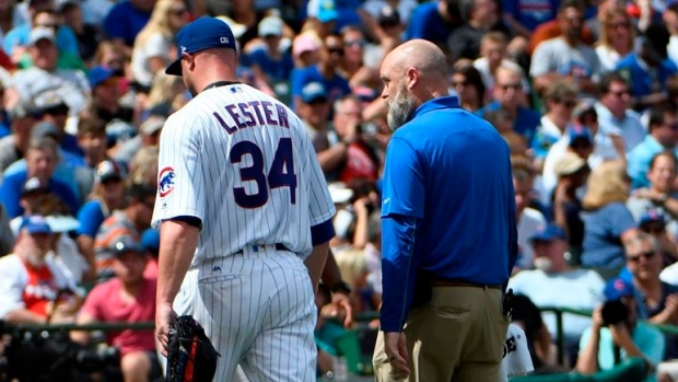 Jon Lester and trainer, The Canadian Press Jon Lester and trainer