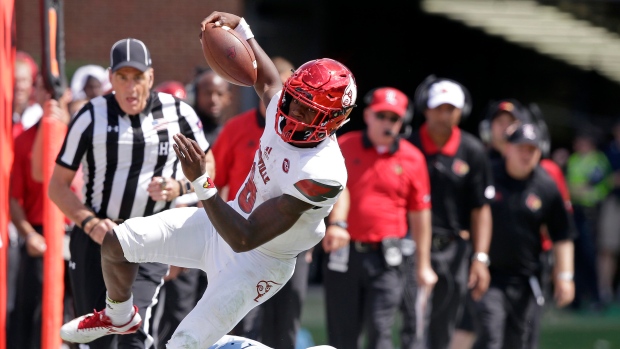 Lamar Jackson and Donnie Miles, The Canadian Press Lamar Jackson and Donnie Miles