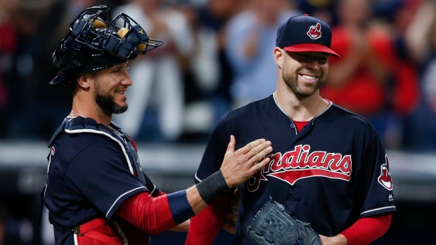 Corey Kluber, Yan Gomes, The Canadian Press Corey Kluber, Yan Gomes