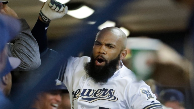 Eric Thames celebrates, The Canadian Press Eric Thames celebrates