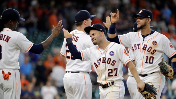 Astros celebrate, The Canadian Press Astros celebrate