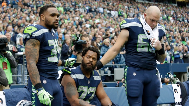 Thomas Rawls Michael Bennett Justin Britt, The Canadian Press Thomas Rawls Michael Bennett Justin Britt