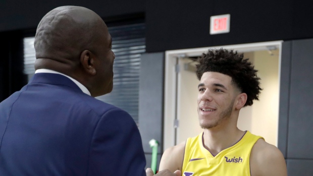 Magic Johnson and Lonzo Ball, The Canadian Press Magic Johnson and Lonzo Ball