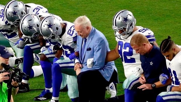 Jerry Jones and Dallas Cowboys kneel during anthem
