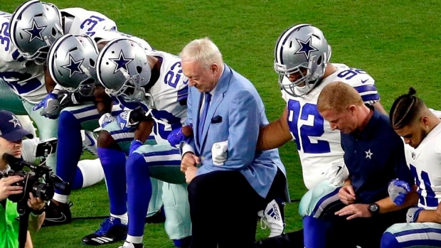 Jerry Jones and Dallas Cowboys kneel during anthem, The Canadian Press Jerry Jones and Dallas Cowboys kneel during anthem