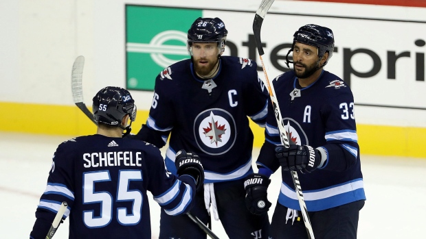 Winnipeg Jets celebrate goal, The Canadian Press Winnipeg Jets celebrate goal