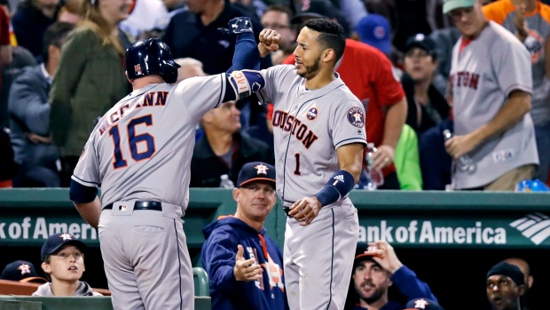 Brian McCann and Carlos Correa, The Canadian Press Brian McCann and Carlos Correa