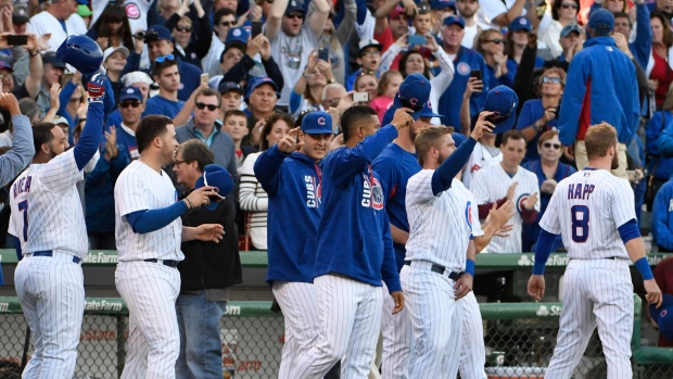 Cubs waive to fans, The Canadian Press Cubs waive to fans