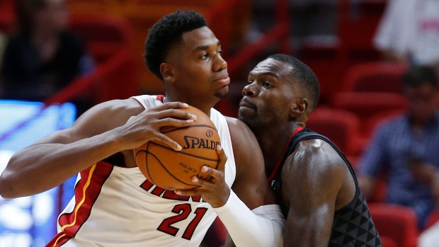 Hassan Whiteside Dewayne Dedmon, The Canadian Press Hassan Whiteside Dewayne Dedmon