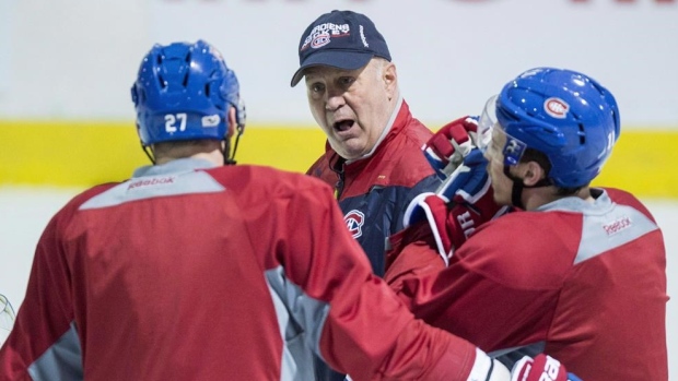 Claude Julien speaks with Alex Galchenyuk and Brendan Gallagher at practice