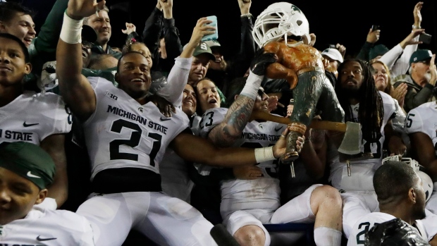 Michigan State celebrates victory, The Canadian Press Michigan State celebrates victory