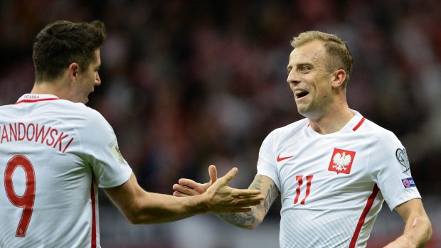 Robert Lewandowski and Kamil Grosicki, The Canadian Press Robert Lewandowski and Kamil Grosicki
