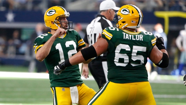 Aaron Rodgers and Lane Taylor celebrate