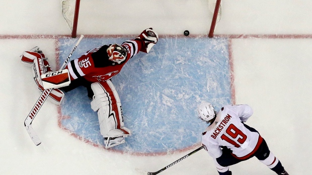 Devils lose first game to Backstrom, Caps - 0