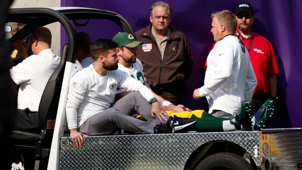 Aaron Rodgers getting carted off the field, The Canadian Press Aaron Rodgers getting carted off the field