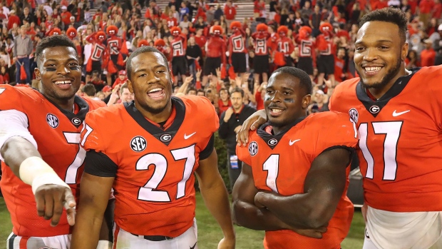Nick Chubb (27) and Sony Michel (1)
