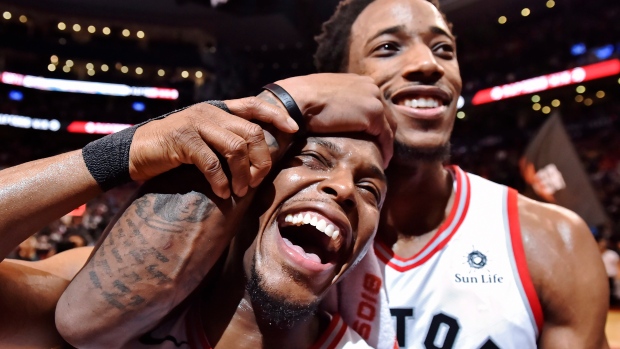 DeMar DeRozan and Kyle Lowry embrace, The Canadian Press DeMar DeRozan and Kyle Lowry embrace