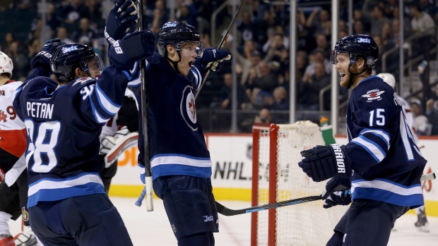 Winnipeg Jets Celebrate, The Canadian Press Winnipeg Jets Celebrate