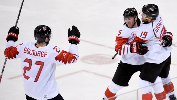 Team Canada celebrates, The Canadian Press Team Canada celebrates