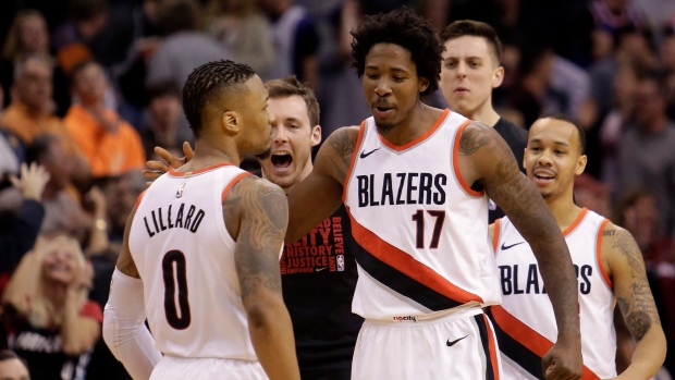 Damian Lillard Ed Davis, The Canadian Press Damian Lillard Ed Davis