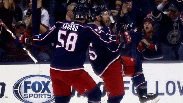 David Savard and Mark Letestu celebrate goal