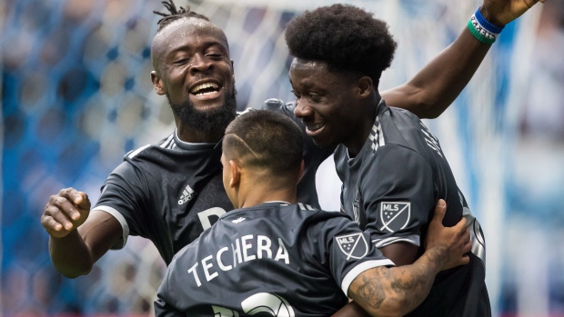 Alphonso Davies, Whitecaps celebrate, The Canadian Press Alphonso Davies, Whitecaps celebrate
