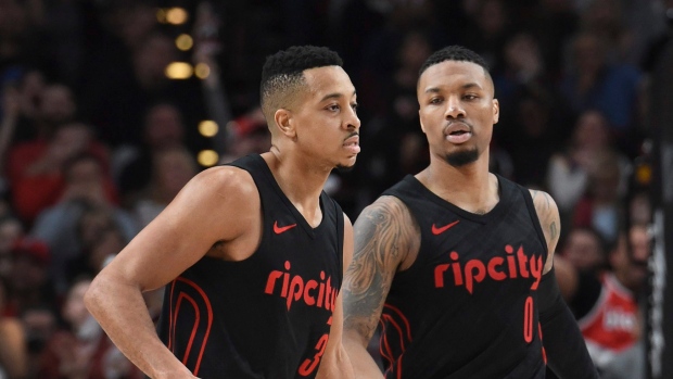 Damien Lillard, C. J. McCollum, The Canadian Press Damien Lillard, C. J. McCollum