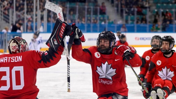 Billy Bridges and Team Canada Celebrate, The Canadian Press Billy Bridges and Team Canada Celebrate
