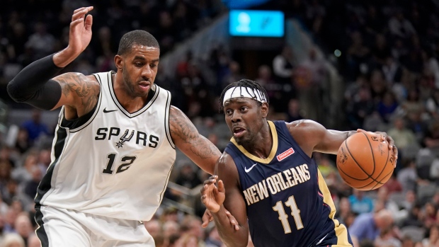 LaMarcus Aldridge Jrue Holiday, The Canadian Press LaMarcus Aldridge Jrue Holiday