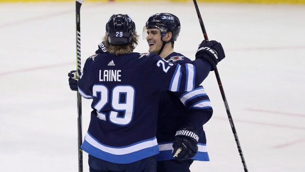 Patrik Laine Mark Scheifele, The Canadian Press Patrik Laine Mark Scheifele