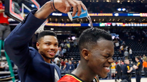 Kent Bazemore and Dennis Schroder, The Canadian Press Kent Bazemore and Dennis Schroder