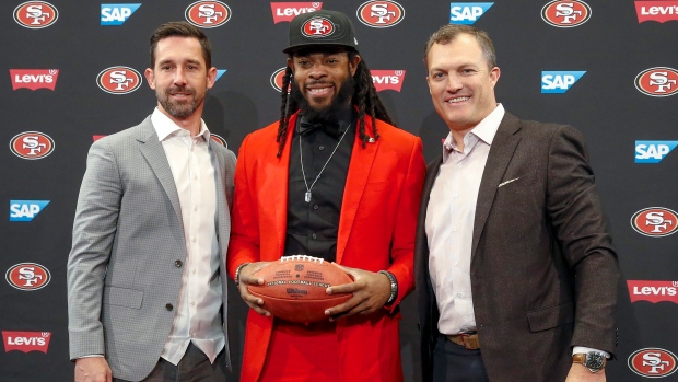 Kyle Shanahan Richard Sherman John Lynch, The Canadian Press Kyle Shanahan Richard Sherman John Lynch