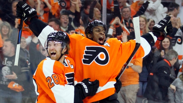 Simmonds, Giroux celebrate, The Canadian Press Simmonds, Giroux celebrate