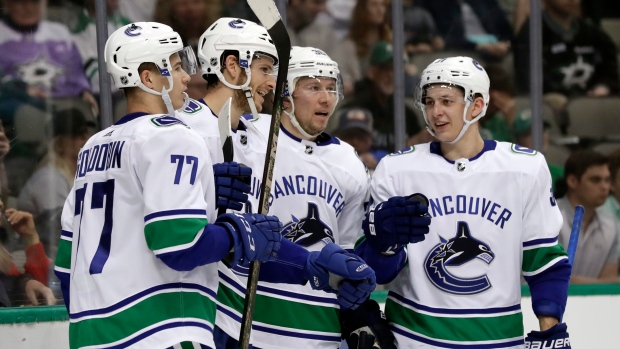 Vancouver Canucks celebrate goal, The Canadian Press Vancouver Canucks celebrate goal