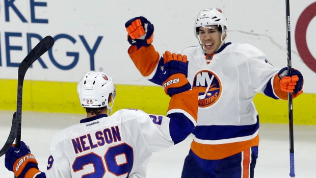 Nelson and Hamonic celebrate, The Canadian Press Nelson and Hamonic celebrate