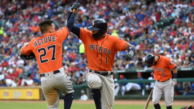 Carlos Correa and Jose Altuve celebrate, The Canadian Press Carlos Correa and Jose Altuve celebrate