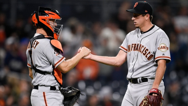 Derek Law and Buster Posey