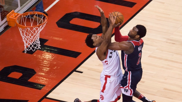 Kyle Lowry blocks John Wall