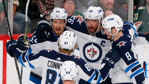Winnipeg Jets celebrate goal, The Canadian Press Winnipeg Jets celebrate goal