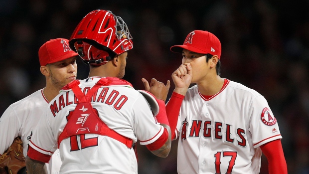 Martin Maldonado Shohei Ohtani, The Canadian Press Martin Maldonado Shohei Ohtani