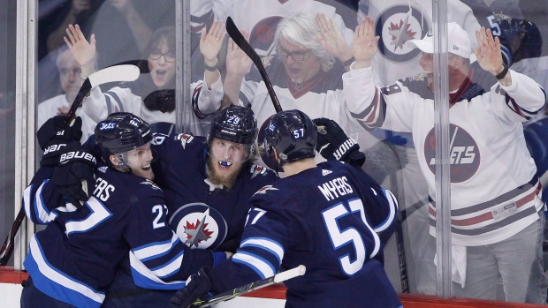 Nikolaj Ehlers, Patrik Laine, Tyler Myers , The Canadian Press Nikolaj Ehlers, Patrik Laine, Tyler Myers