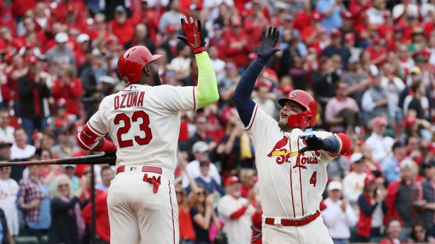 Yadier Molina and Marcell Ozuna, The Canadian Press Yadier Molina and Marcell Ozuna