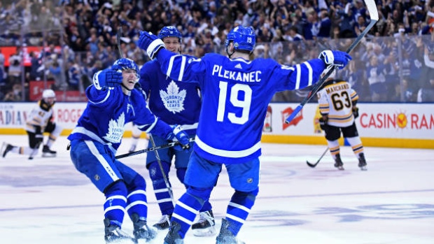 Plekanec, Marner and Zaitsev celebrate