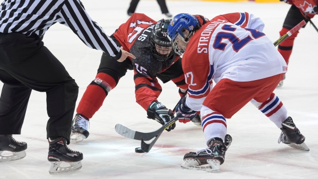 Hillis faces off against Strondala, IIHF/HHOF - Images on Ice Hillis faces off against Strondala