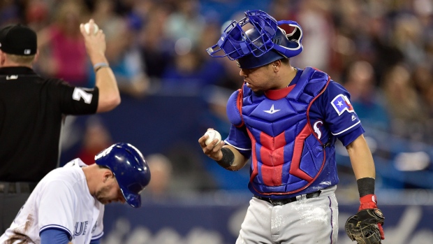Justin Smoak and Juan Centeno , The Canadian Press Justin Smoak and Juan Centeno